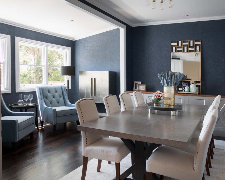 Dark blue, grey dining and seating area.