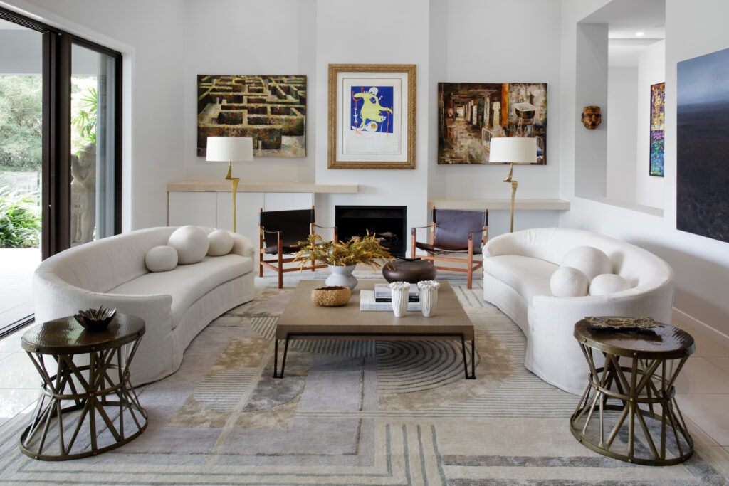 Luxury living room with two unique white sofas