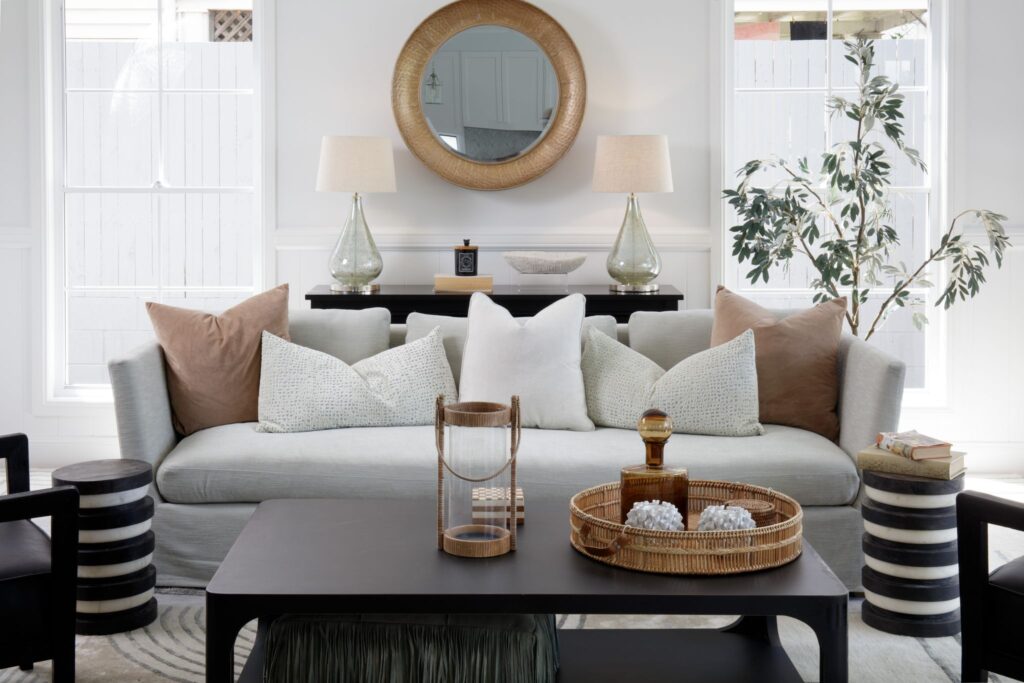 Modern, light living area with a comfy sofa