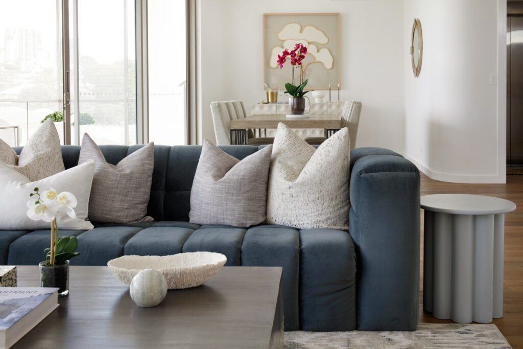Cosy blue sofa in a modern living/dining room