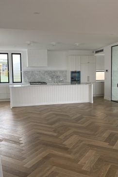 Empty open-plan kitchen and living room