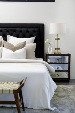 Luxury bedroom with a mirrored draw side table