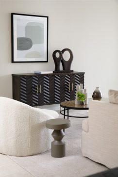 cosy neutral living area with dark wood side table